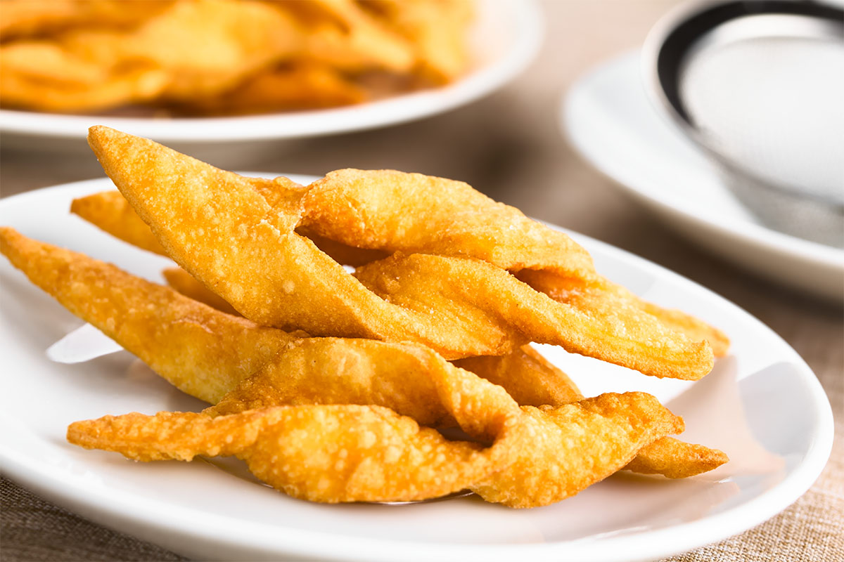Ukrainian fried pastries with black cardamom (verhuny)